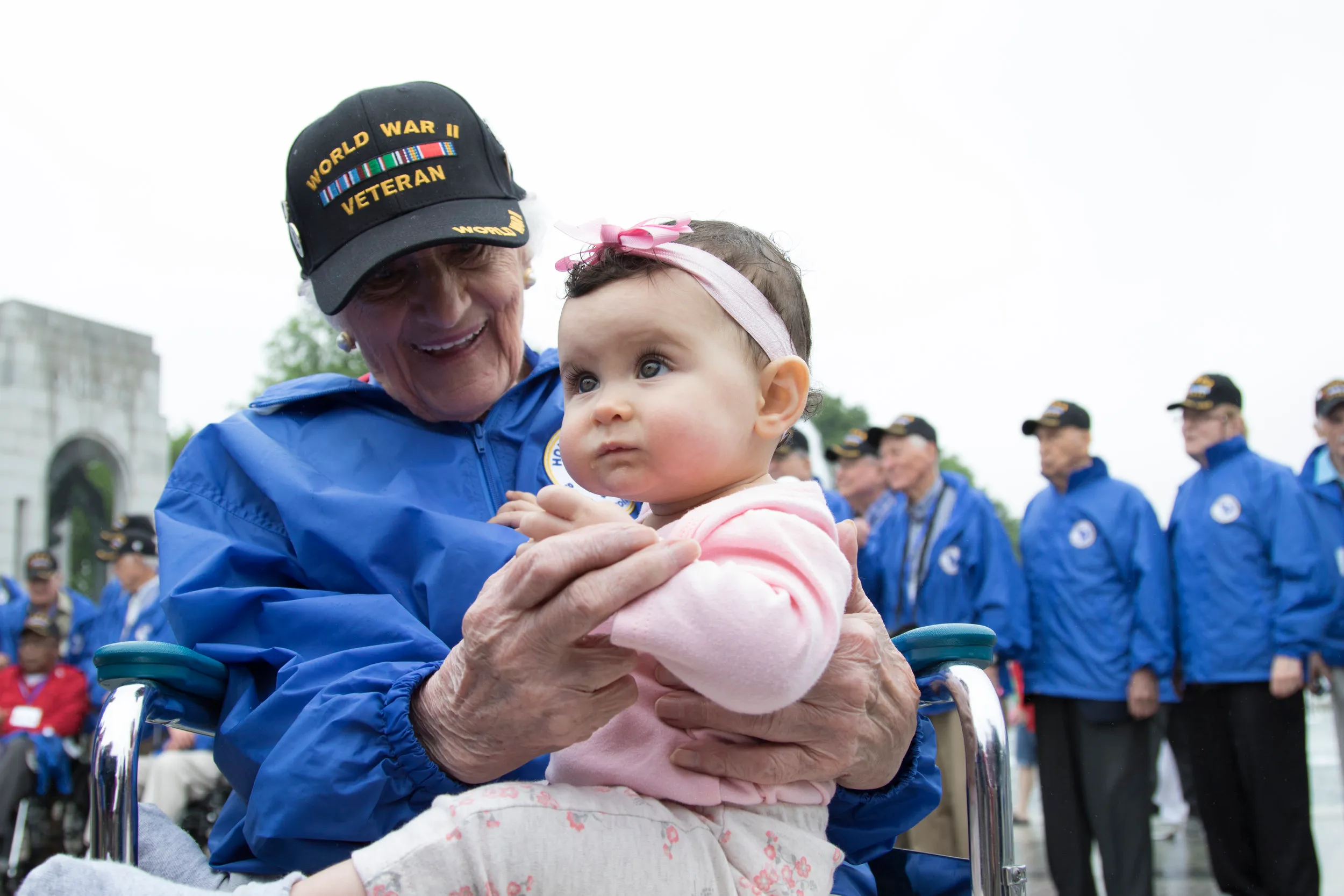 World War II veteran Susan Briggs, of South Carolina, hugs her great-granddaughter, Scarlett Briggs, 8-months-old, while touring the World War II Memorial in Washington, D.C., on May 11, 2016. Sixty-six World War II and Korean War veterans flew fro